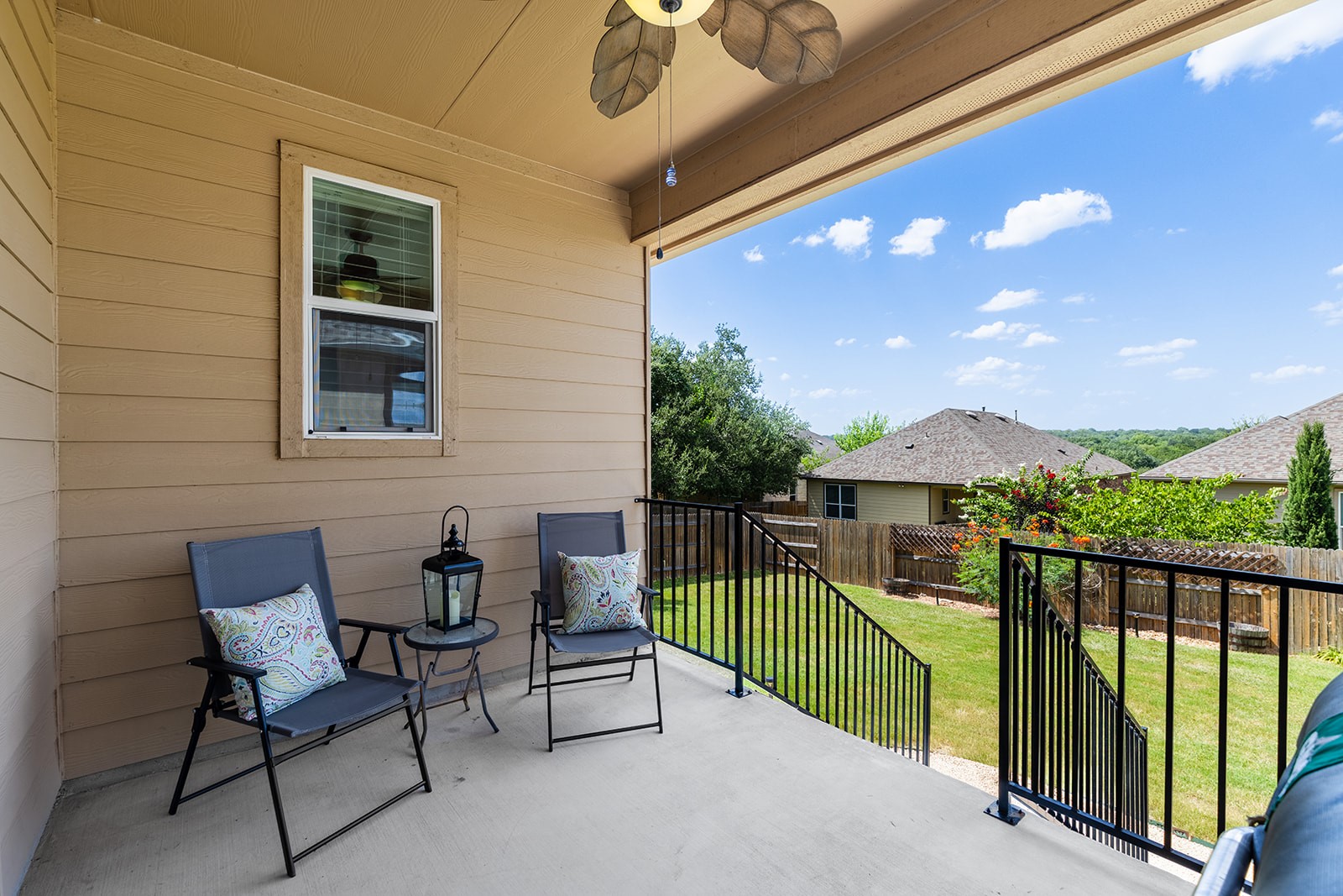 437 Sheepshank Drive Georgetown, TX 78633 - Photo 17 of 22 Relax on this covered concrete patio facing north, offering views of the tree tops and surrounding neighborhood.