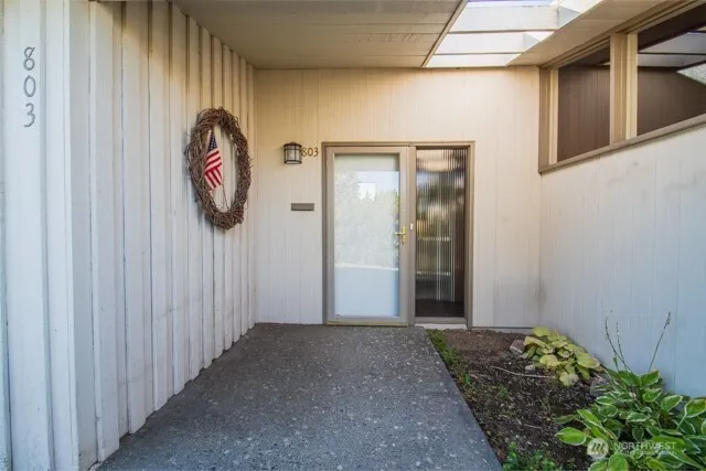 a view of a hallway with entryway