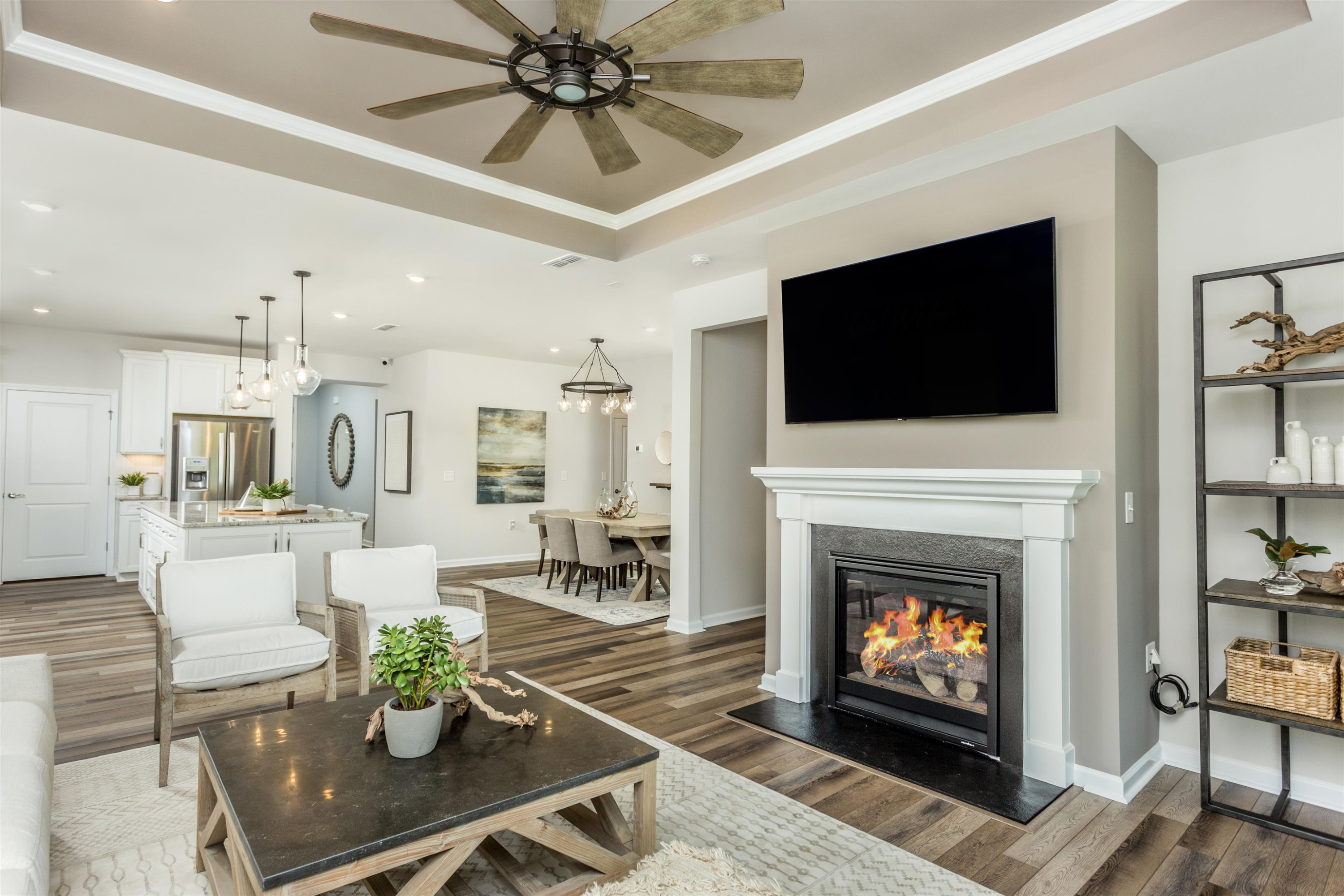 1405 Hornbeam Road Fuquay-Varina, NC 27526 - Photo 16 of 25 a living room with furniture a flat screen tv and a fireplace