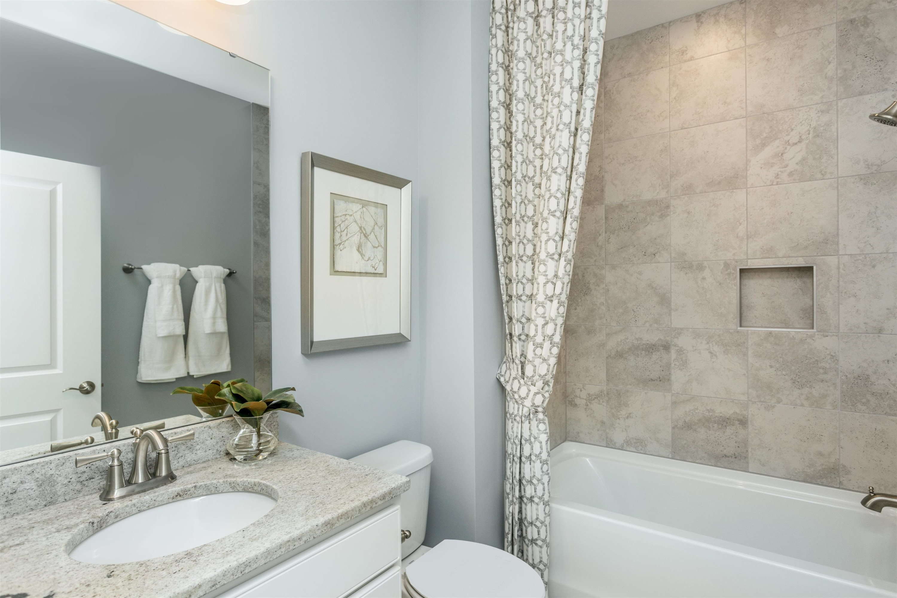 1405 Hornbeam Road Fuquay-Varina, NC 27526 - Photo 23 of 25 a bathroom with a granite countertop sink toilet and shower
