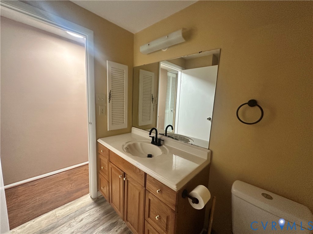 9319 Coleson Road Glen Allen, VA 23060 - Photo 19 of 39 a bathroom with a sink and a mirror