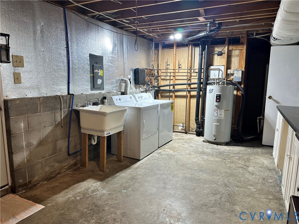 9319 Coleson Road Glen Allen, VA 23060 - Photo 21 of 39 a kitchen with a sink and refrigerator