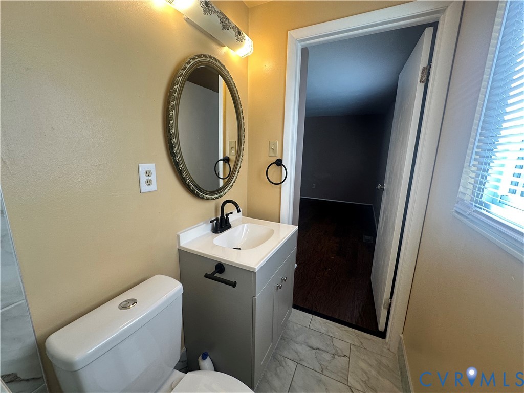 9319 Coleson Road Glen Allen, VA 23060 - Photo 24 of 39 a bathroom with a toilet and a sink