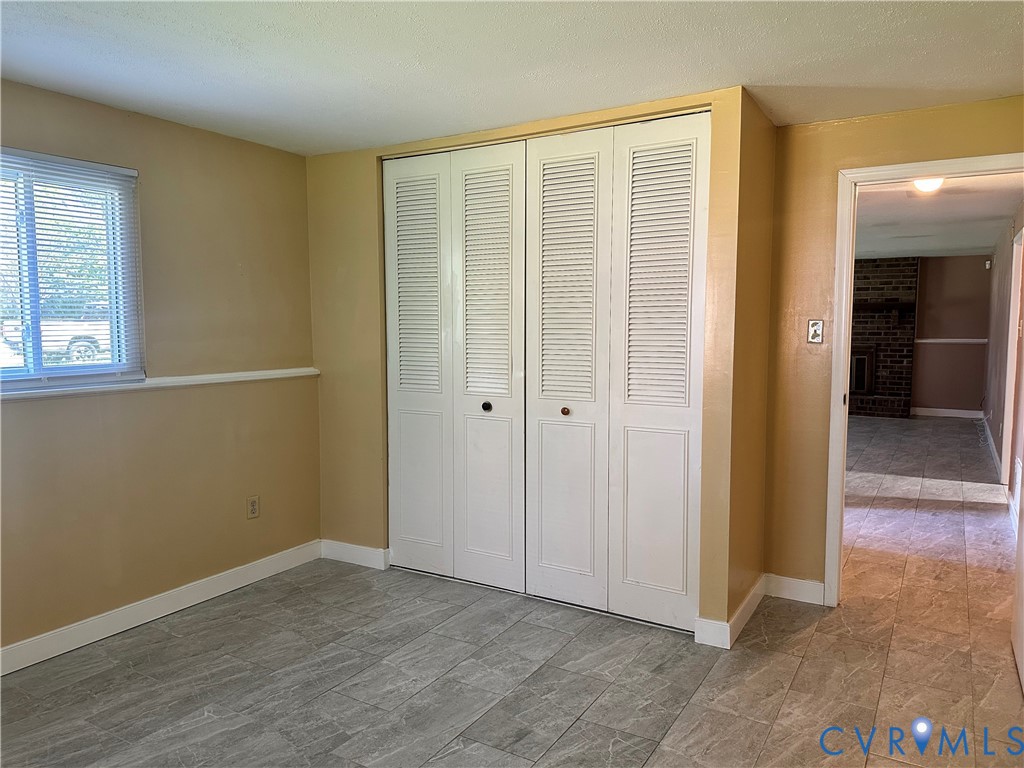 9319 Coleson Road Glen Allen, VA 23060 - Photo 27 of 39 an empty room with windows