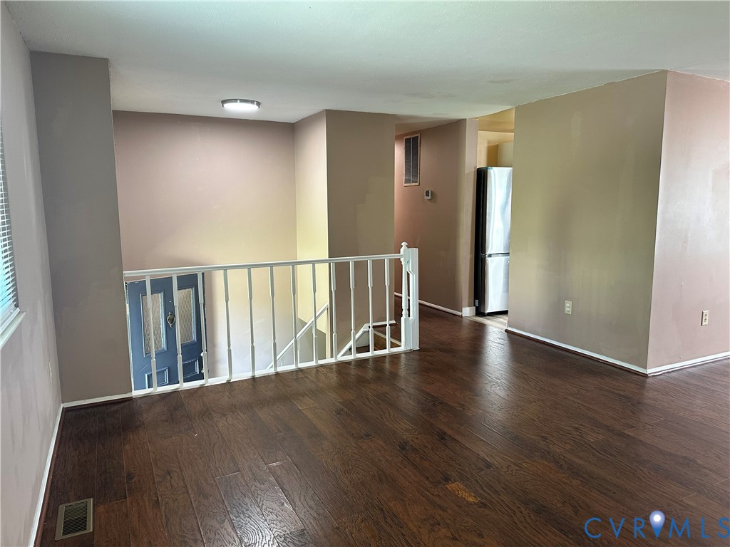 9319 Coleson Road Glen Allen, VA 23060 - Photo 7 of 39 a view of hallway with wooden floor
