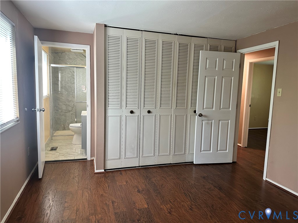 9319 Coleson Road Glen Allen, VA 23060 - Photo 9 of 39 a view of a bathroom with wooden floor and a small yard