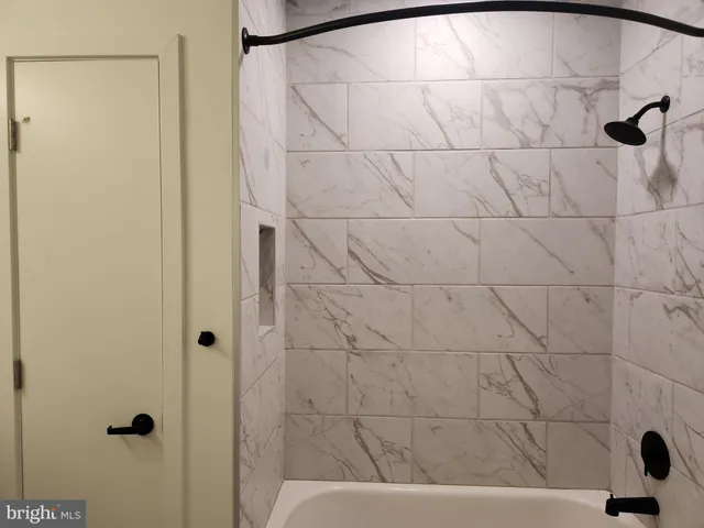 a bathroom with a bathtub