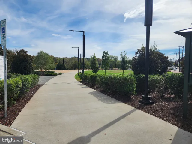 a view of a street with a building in the background