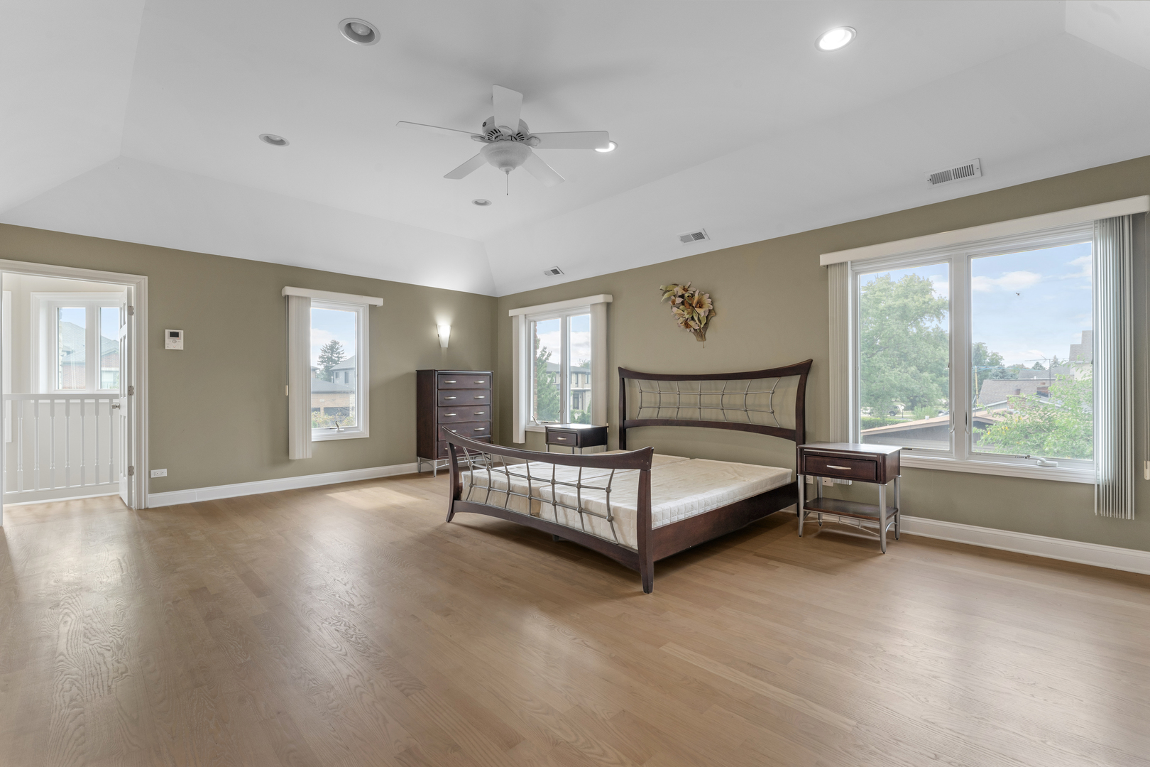 1184 Prospect Lane Des Plaines, IL 60018 - Photo 12 of 24 a spacious bedroom with a bed and large window