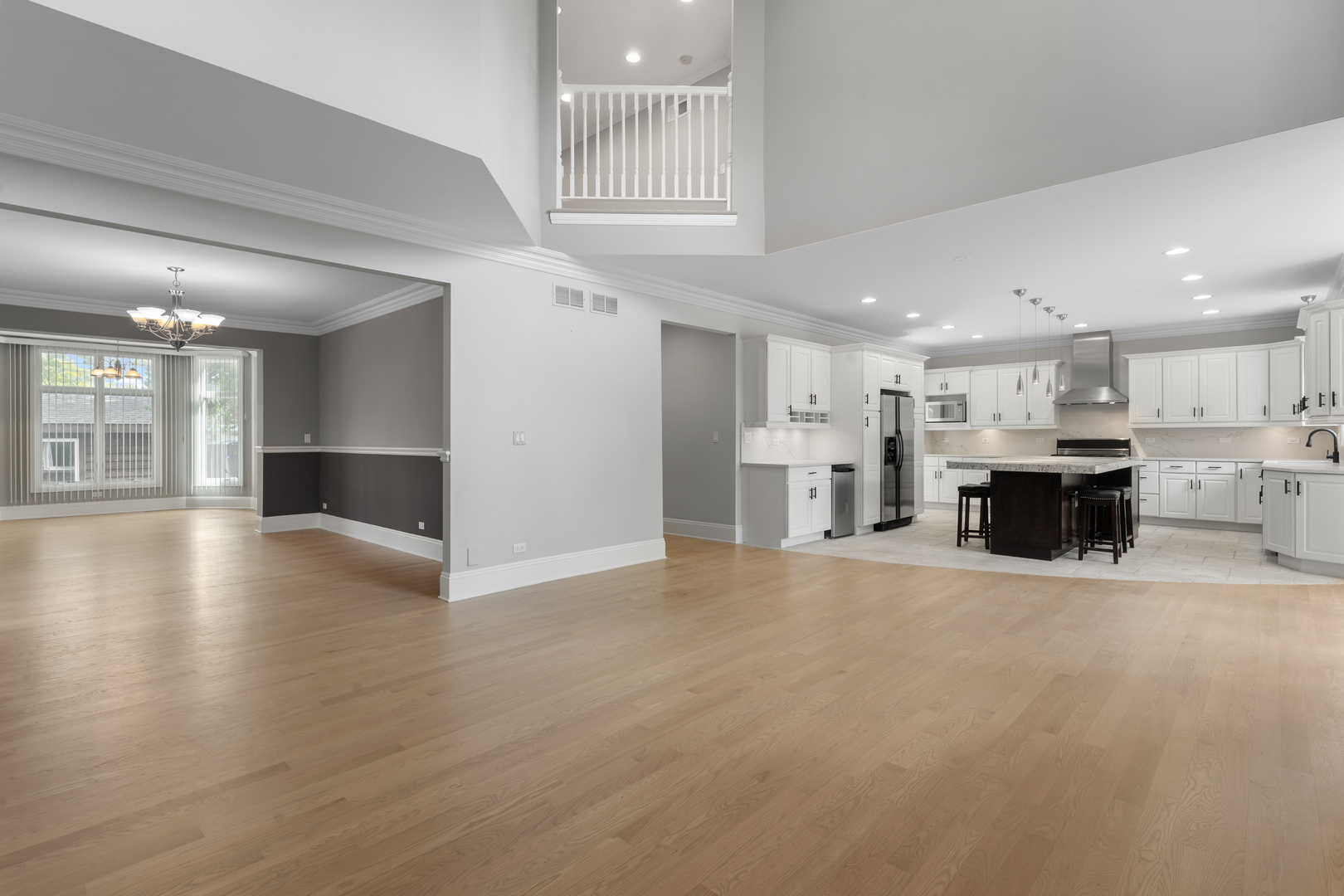 1184 Prospect Lane Des Plaines, IL 60018 - Photo 2 of 24 a view of a kitchen with a stove cabinets wooden floor and a kitchen