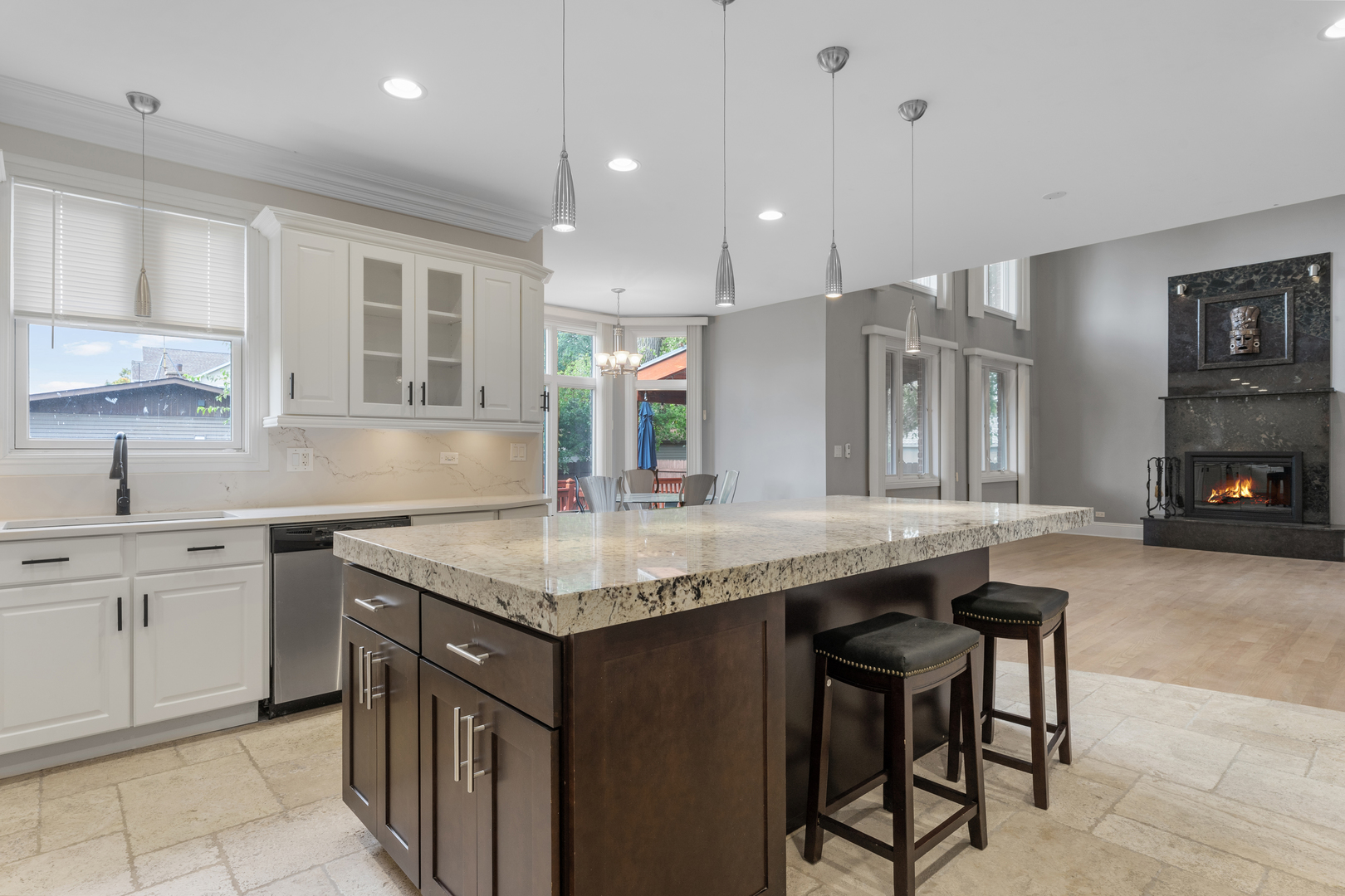 1184 Prospect Lane Des Plaines, IL 60018 - Photo 5 of 24 a kitchen with center island table and chairs in it