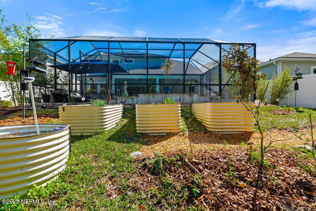 201 Oak Shadow Place St. Johns, FL 32259 - Photo 38 of 52 a view of a swimming pool with a patio