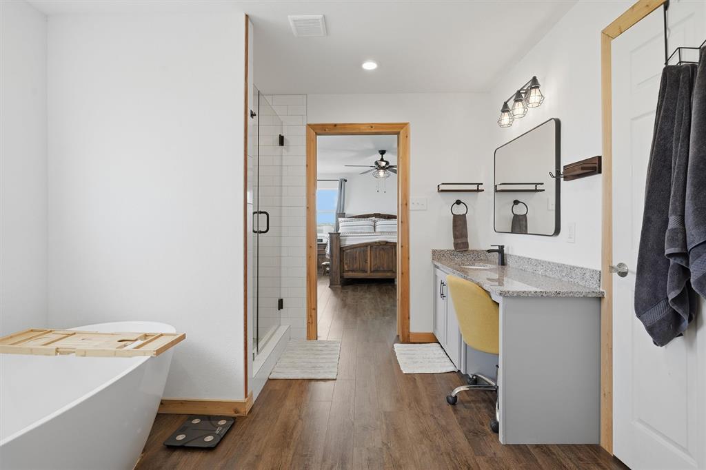 1051 Pigg Road Waxahachie, TX 75165 - Photo 23 of 40 a view of living room with furniture and flat screen tv