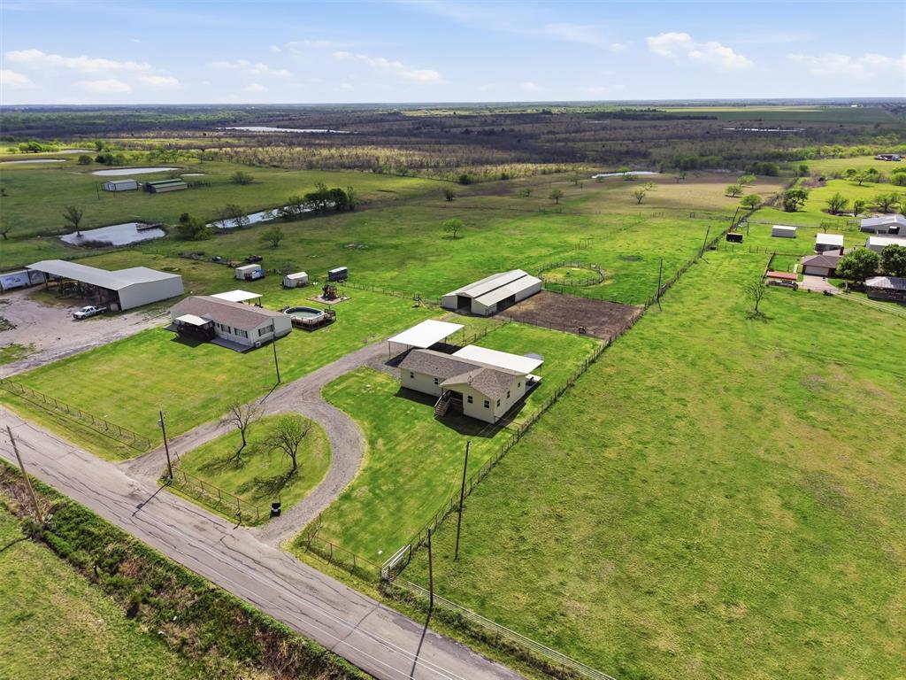 1051 Pigg Road Waxahachie, TX 75165 - Photo 36 of 40 a view of a lake with a yard