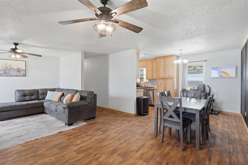 1051 Pigg Road Waxahachie, TX 75165 - Photo 9 of 40 a living room with furniture and a wooden floor