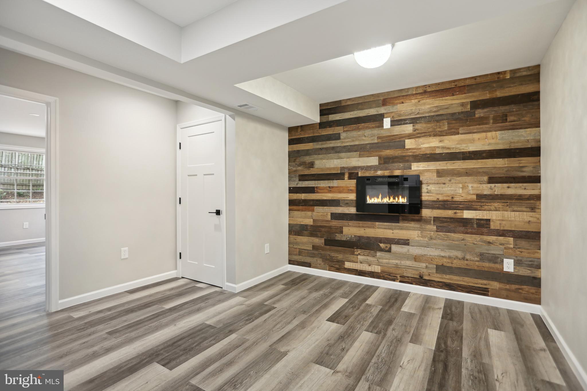 6719 Clinglog Street Capitol Heights, MD 20743 - Photo 9 of 26 Elect Fireplace and built in TV outlet