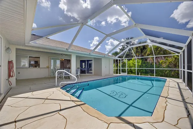 a front view of a house with a large window