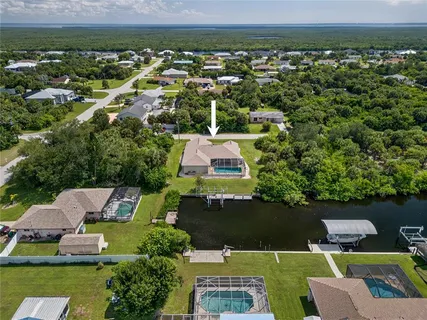an aerial view of a house with a garden