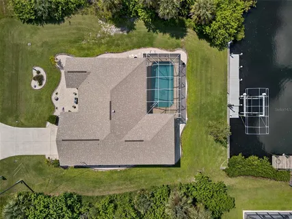 an aerial view of residential building with parking space