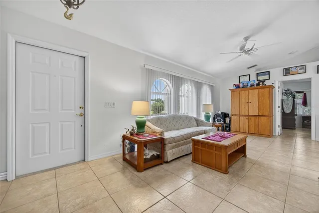 a bedroom with furniture and a table