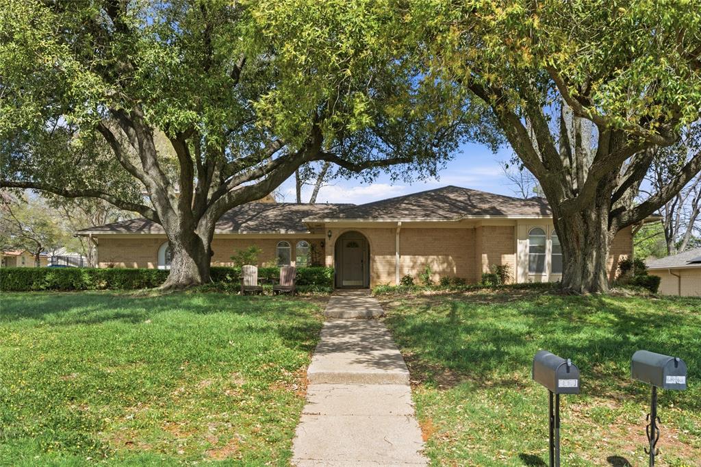 2326 Forest Hills Road Grapevine, TX 76051 - Photo 1 of 37 Single story home with a front yard and brick siding