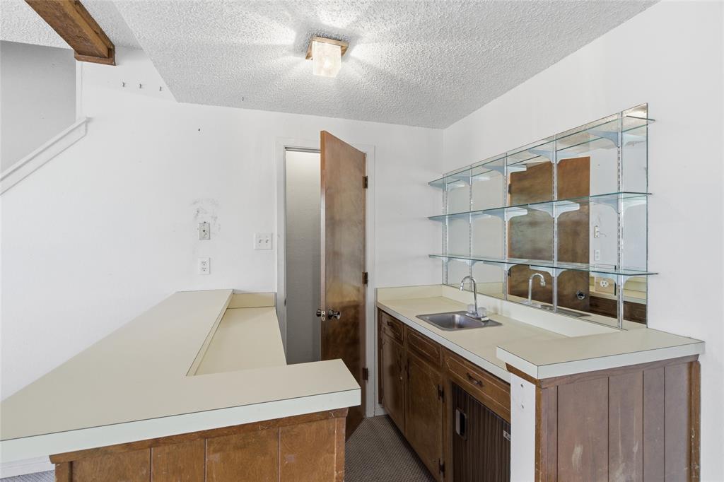 2326 Forest Hills Road Grapevine, TX 76051 - Photo 18 of 37 Wet bar and storage closet