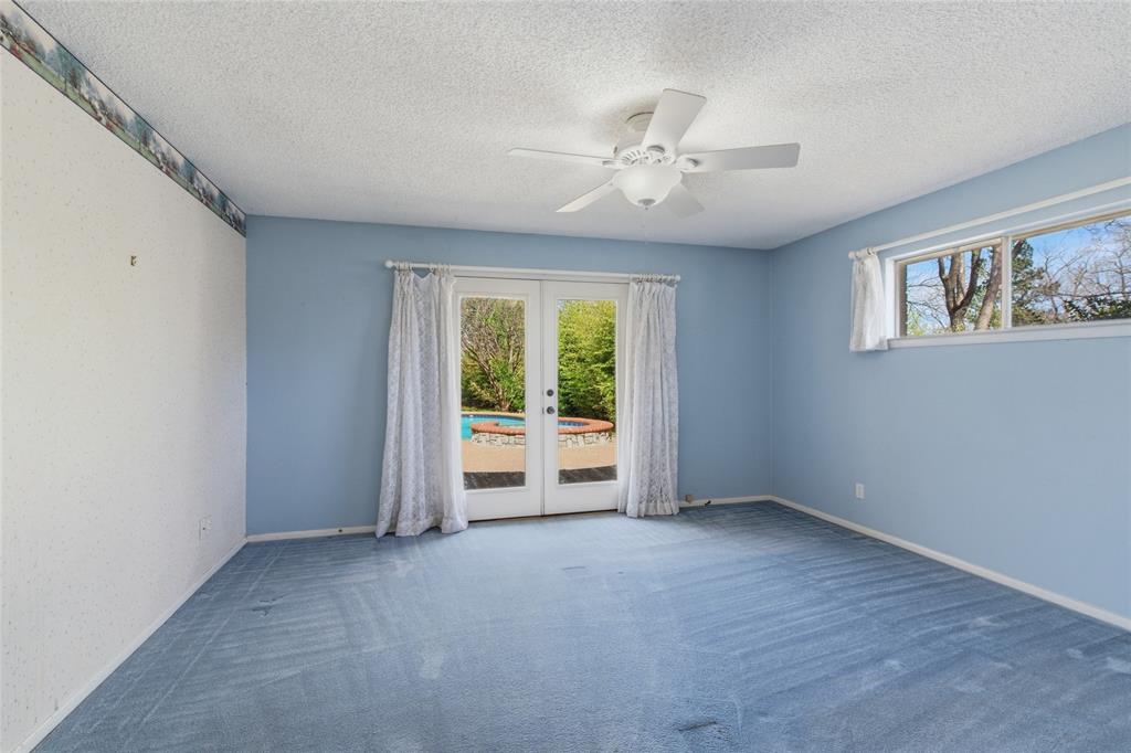 2326 Forest Hills Road Grapevine, TX 76051 - Photo 30 of 37 Secondary bedroom with patio doors to deck