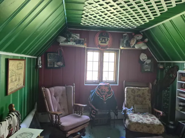 a room with furniture and a wooden floor