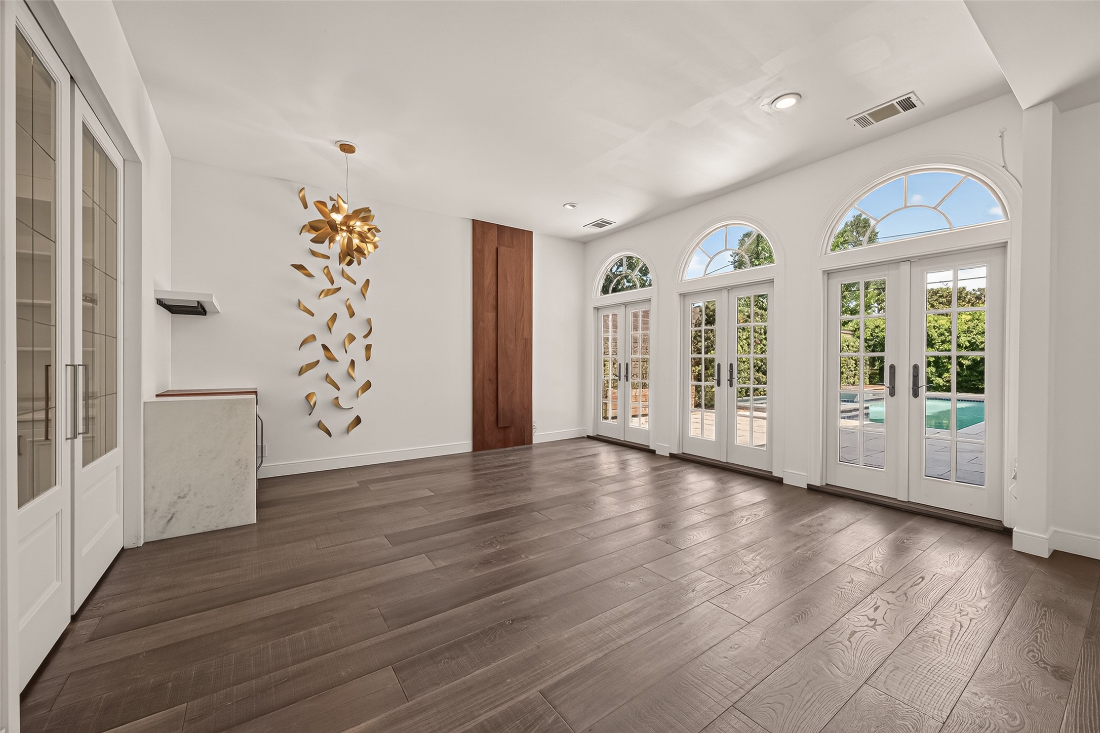 2114 Wroxton Road Houston, TX 77005 - Photo 8 of 50 Open space leads to pool