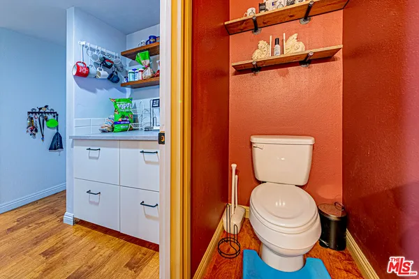 a bathroom with a toilet and a sink