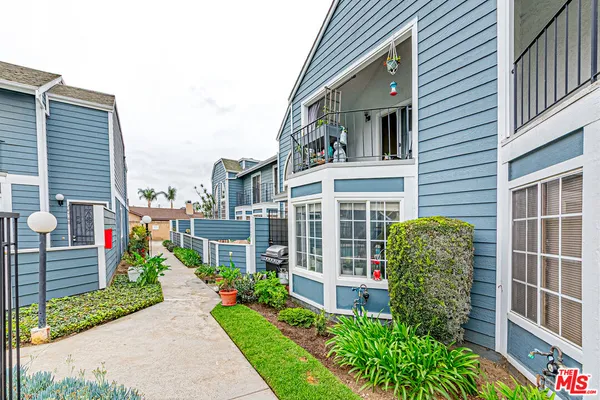 a house view with a garden space