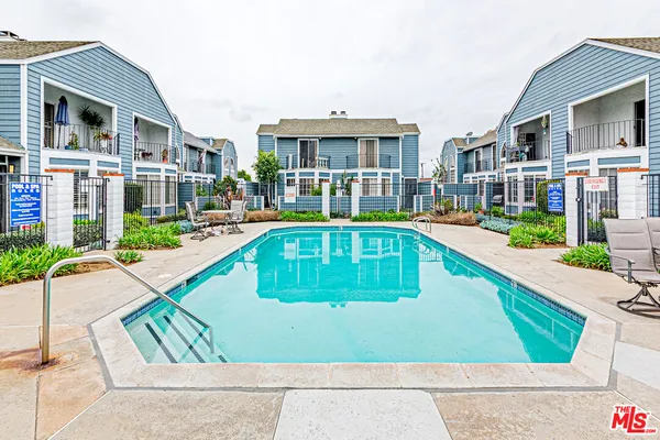 a view of a house with a swimming pool