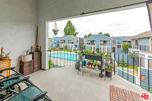 a view of a balcony with city view