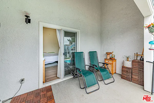 a bedroom with bed and a dresser