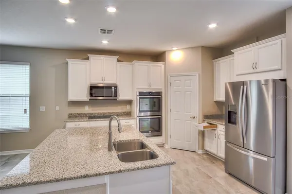 $2,595 | 4923 Rolling Greene Drive, Wesley Chapel, FL 33543