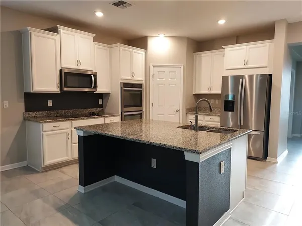 $2,595 | 4923 Rolling Greene Drive, Wesley Chapel, FL 33543