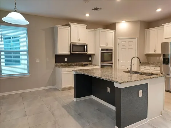 $2,595 | 4923 Rolling Greene Drive, Wesley Chapel, FL 33543