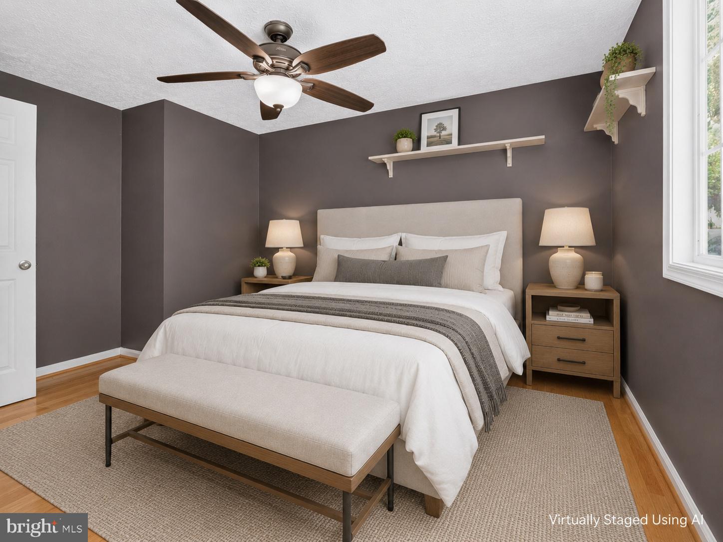 8471 Great Lake Lane Springfield, VA 22153 - Photo 19 of 65 a bedroom with a bed and a chandelier