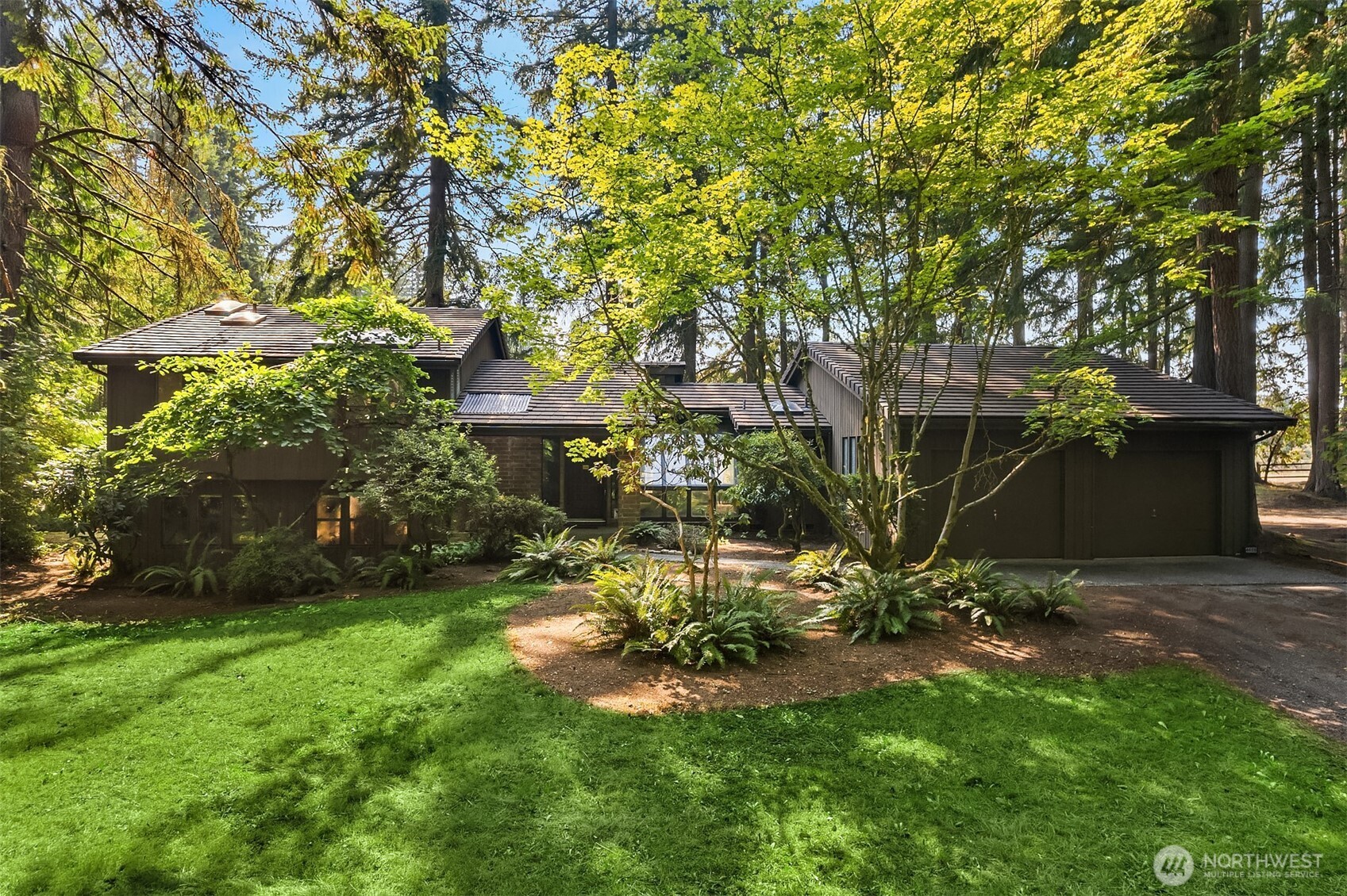4620 156th Street Southeast Bothell, WA 98012 - Photo 3 of 35 a backyard of a house with lots of green space