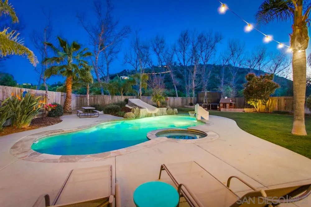 13919 Poway Valley Road Poway, CA 92064 - Photo 11 of 70 a view of a backyard with plants and outdoor seating