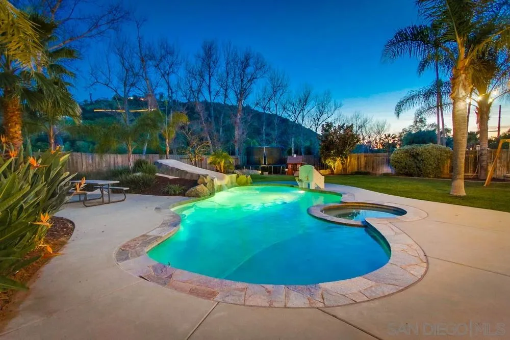 13919 Poway Valley Road Poway, CA 92064 - Photo 12 of 70 a view of a swimming pool with a yard
