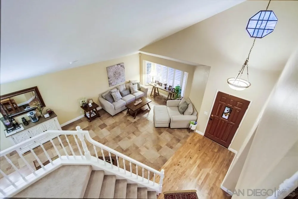 13919 Poway Valley Road Poway, CA 92064 - Photo 33 of 70 a living room with furniture and a flat screen tv