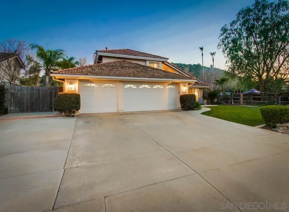 13919 Poway Valley Road Poway, CA 92064 - Photo 4 of 70 a view of a house with a yard