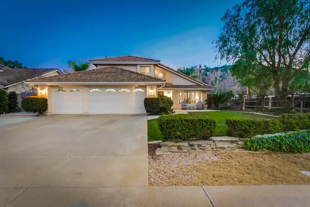 13919 Poway Valley Road Poway, CA 92064 - Photo 5 of 70 a front view of a house with a yard
