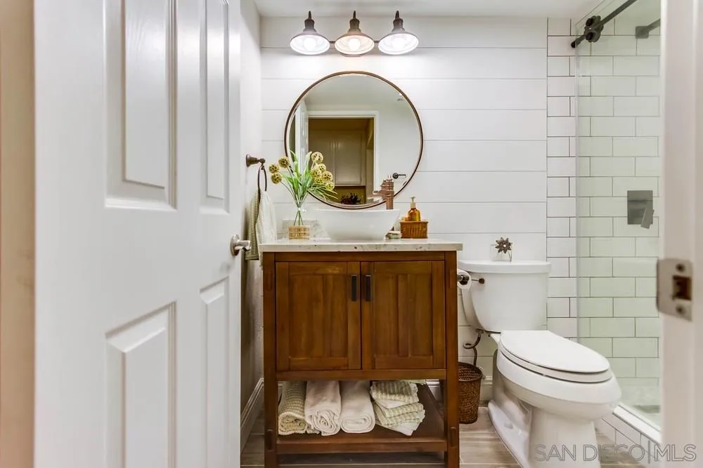 13919 Poway Valley Road Poway, CA 92064 - Photo 52 of 70 a bathroom with a toilet and a sink