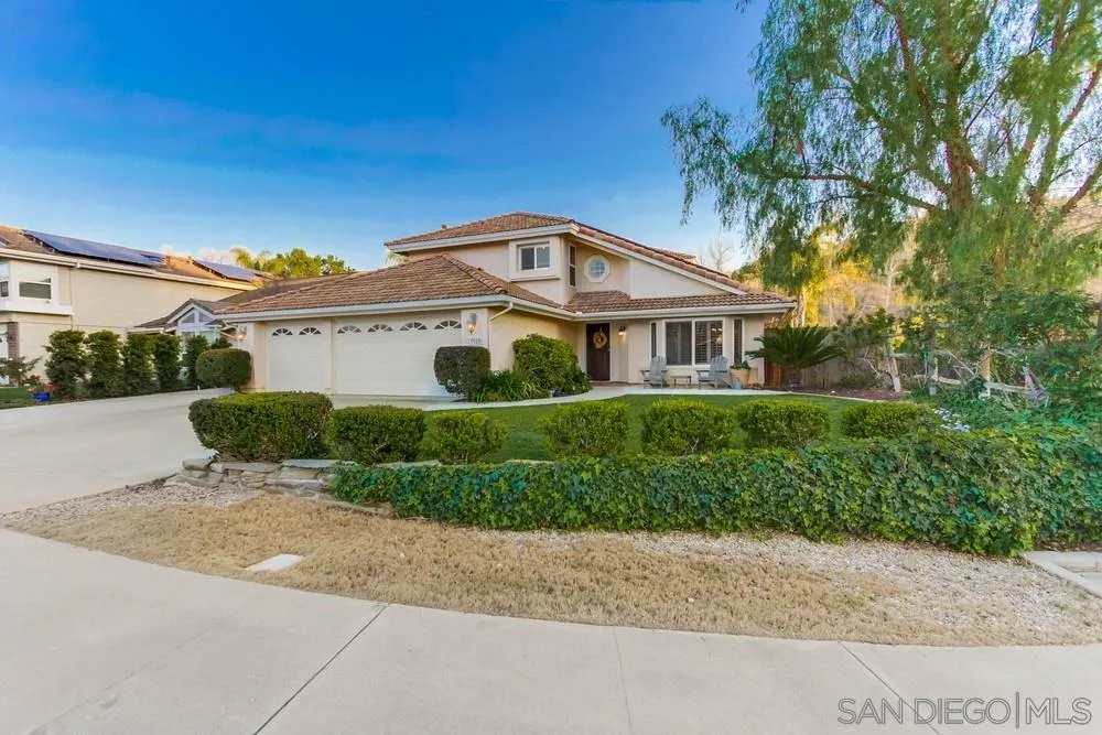 13919 Poway Valley Road Poway, CA 92064 - Photo 54 of 70 a front view of a house with a yard