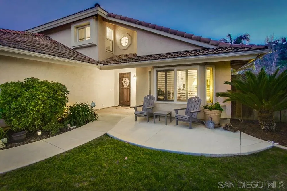 13919 Poway Valley Road Poway, CA 92064 - Photo 6 of 70 a view of a house with patio and a garden