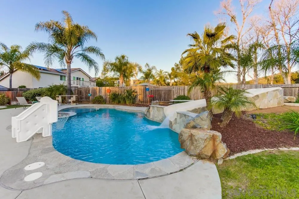13919 Poway Valley Road Poway, CA 92064 - Photo 62 of 70 a view of a swimming pool with a sitting area