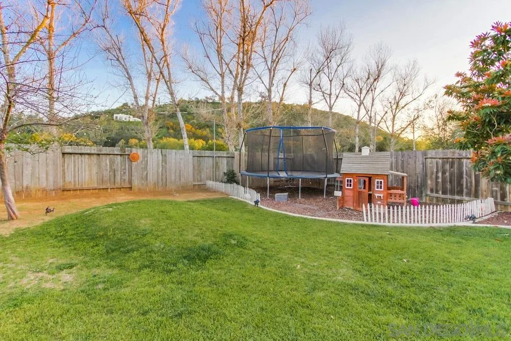 13919 Poway Valley Road Poway, CA 92064 - Photo 64 of 70 a view of a park with wooden fence and a bench
