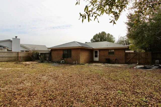 a house view with a garden space